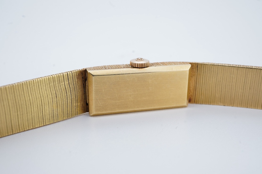 A lady's 1960's 18ct gold manual wind bracelet watch, overall length 16.5cm, gross weight 37.1 grams. Condition - fair to good